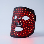 GlowNest black silicone LED face mask glowing red